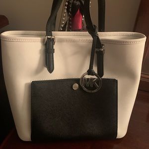 Michael Kors white/black handbag/ silver hardware. Gently used, great condition
